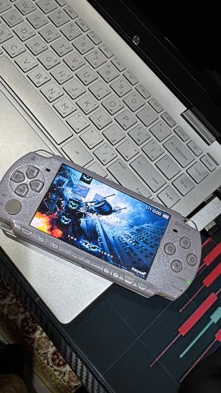 Sony Psp-2000 with usb charger, battery, 4gb, 15 installed games.